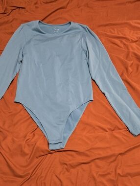 Womens Long-Sleeve Light Blue One-Piece Bodysuit